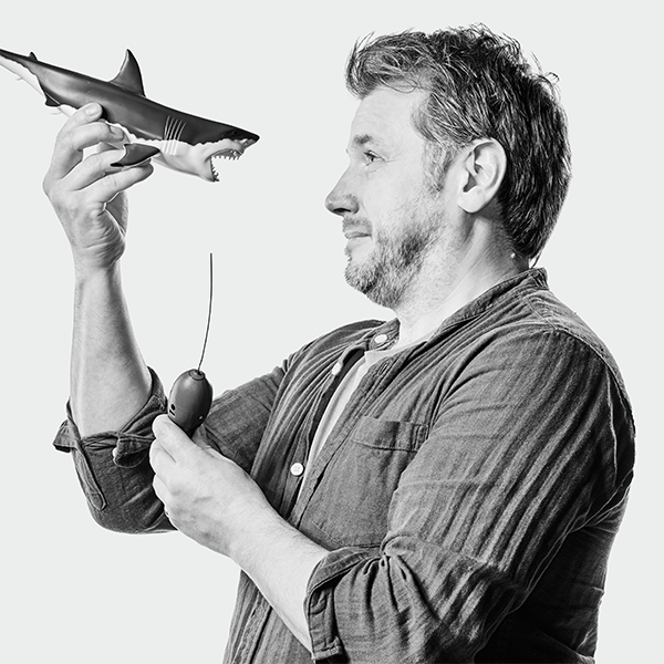James Thorburn with toy shark 
