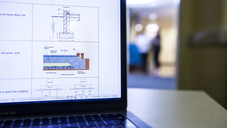 A laptop with quantity surveying software of the screen