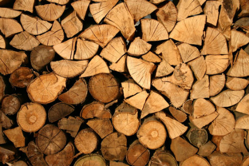 close-up of pile of logs