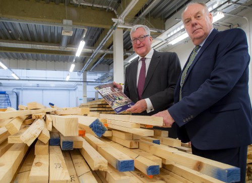 Rural Economy Secretary Fergus Ewing and (right) Martin Gale, Chair of the Industry Leadership Group launch the strategy at Napier University’s timber testing facility in Edinburgh.